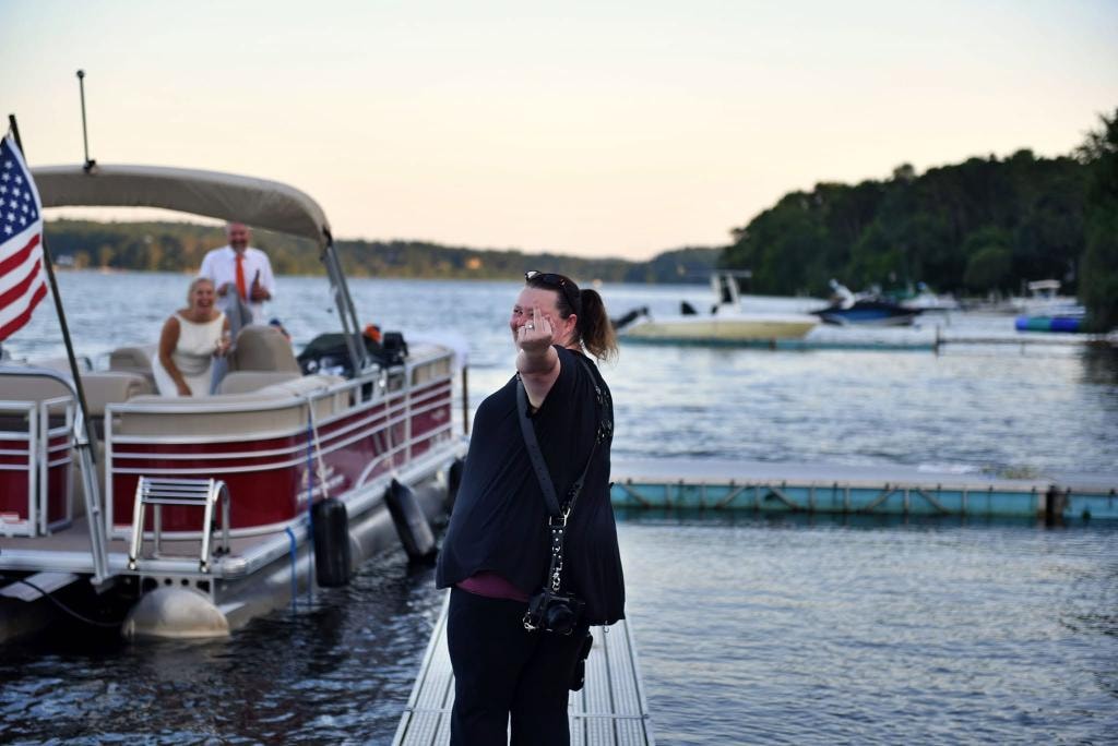 Kate Melody on location at a waterfront event