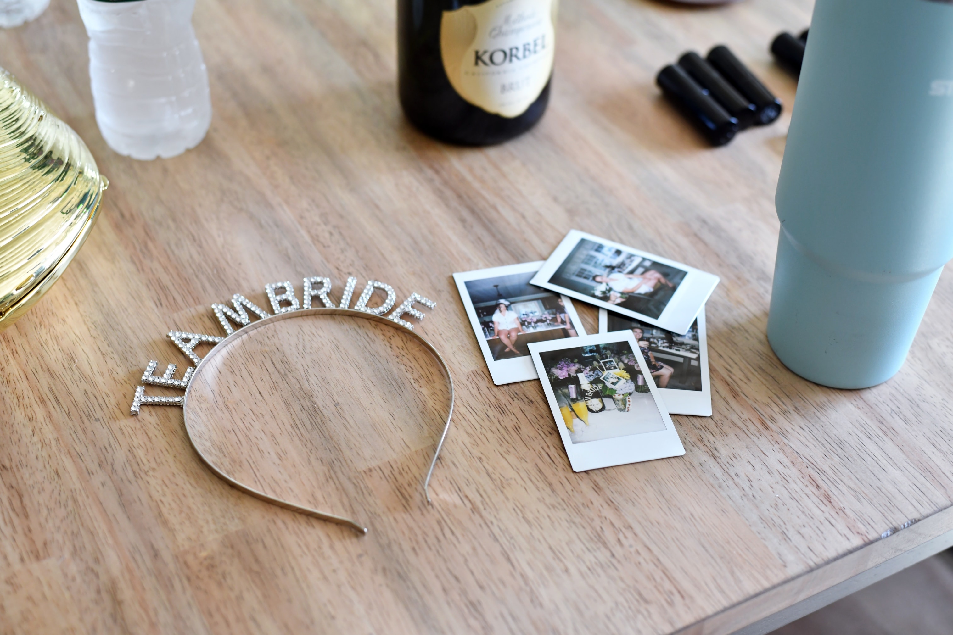 Team Bride tiara headband with polaroid photos on table